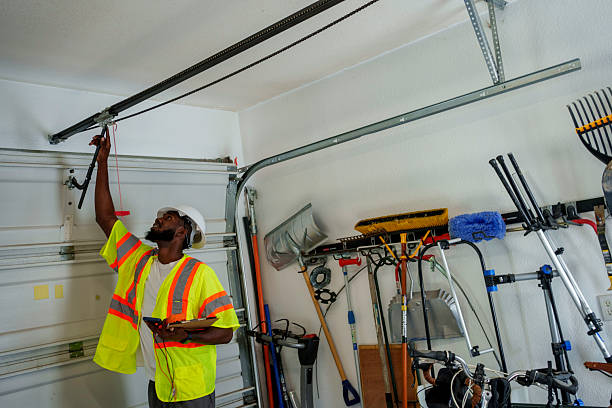 Professional Garage Door Panel Replacement technician working in Clayton County County, GA